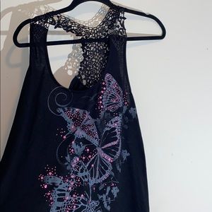 Trapeze high- low blouse with butterfly details!